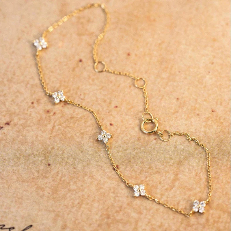 Pulsera Gourmette con Flores Finas en Zirconia dorada