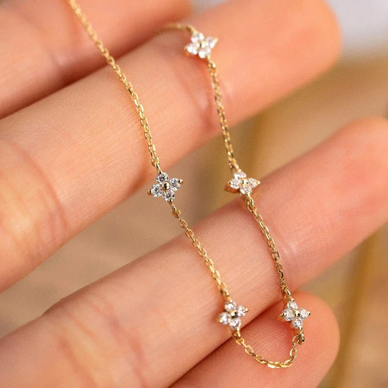 Pulsera Gourmette con Flores Finas en Zirconia dorada