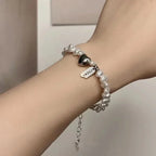 Pulsera Gourmette para Mujer en Perlas con Corazón