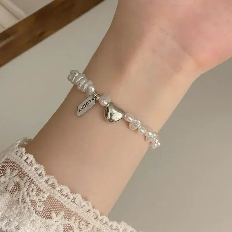 Pulsera Gourmette para Mujer en Perlas con Corazón