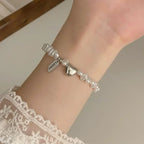 Pulsera Gourmette para Mujer en Perlas con Corazón