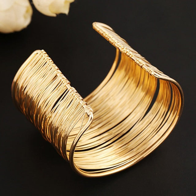 Brazalete rígido grueso de oro y plata para mujer oro