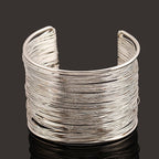 Brazalete rígido grueso de oro y plata para mujer plata