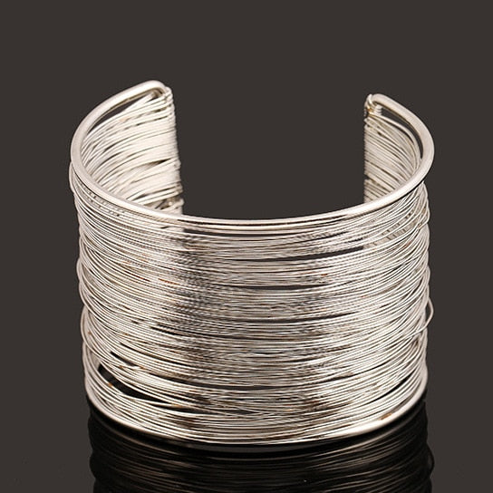 Brazalete rígido grueso de oro y plata para mujer plata