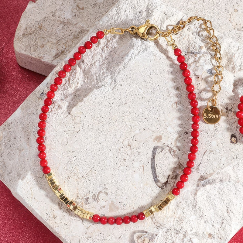 Pulsera coral roja y dorada