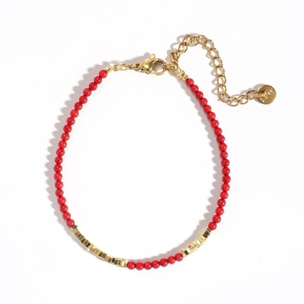 Pulsera coral roja y dorada