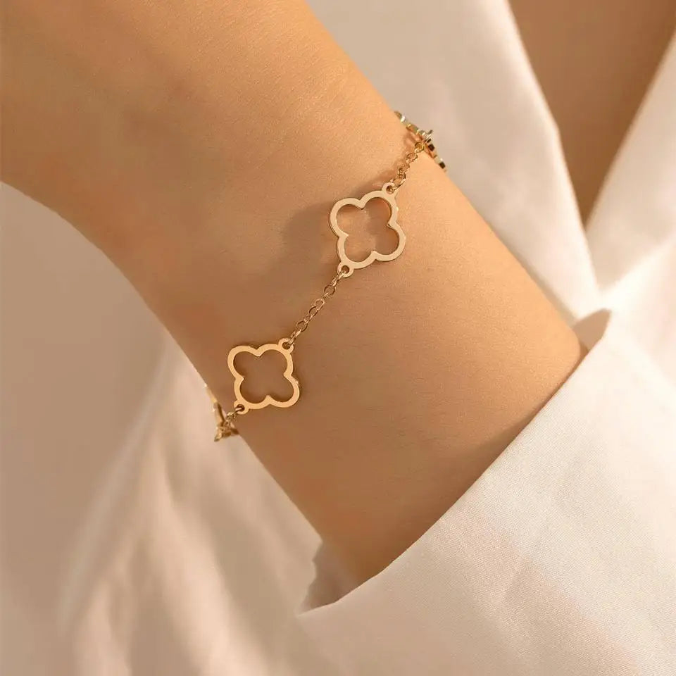 Juego de 2 pulseras con tréboles de 4 hojas en oro