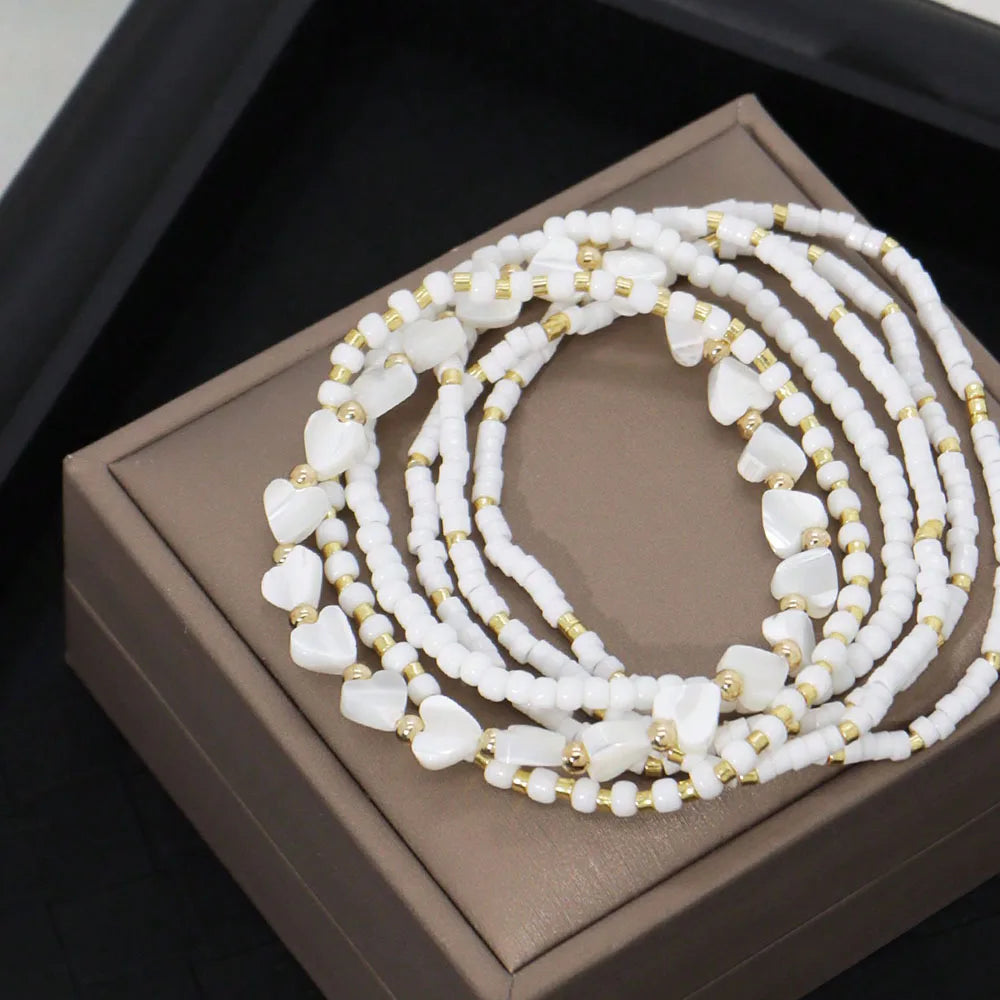 Pulseras de Perlas y Corazones