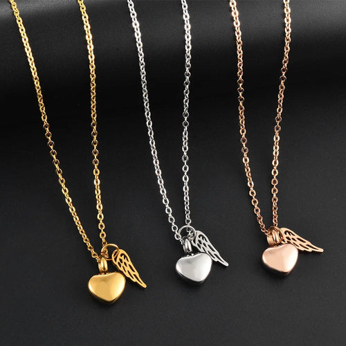 Collar relicario con colgante de alas de ángel y corazón dorado