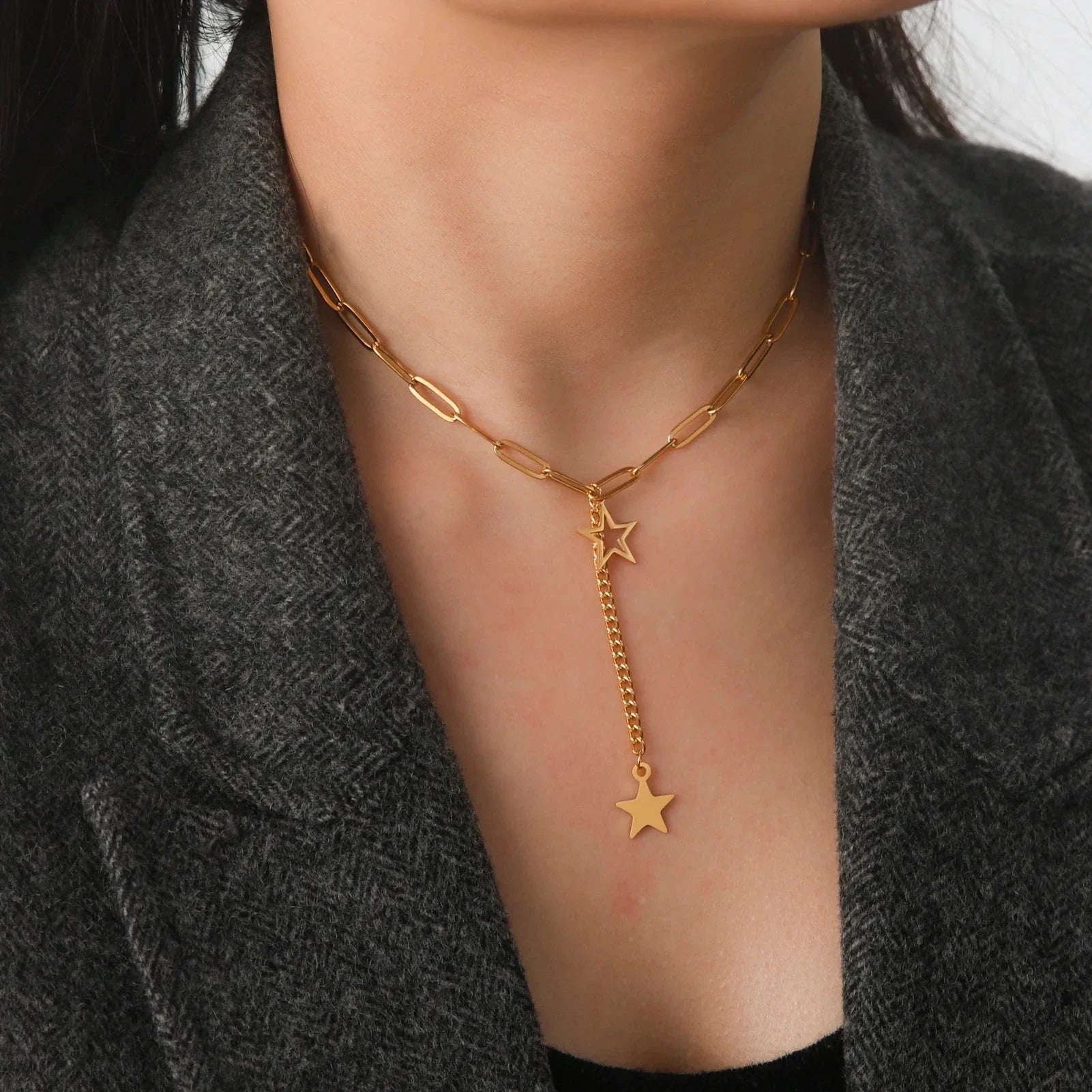 Collar con colgante de estrellas oro