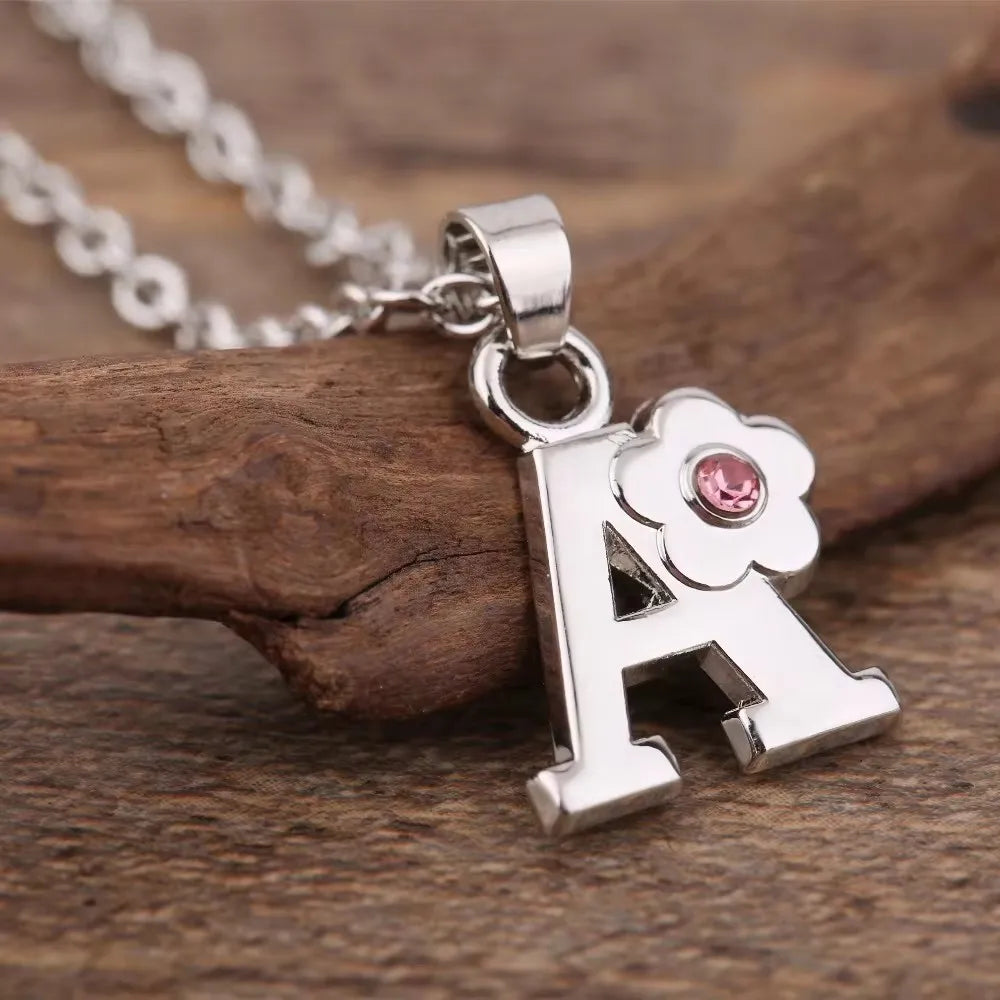 Collar con colgante de inicial y flor a