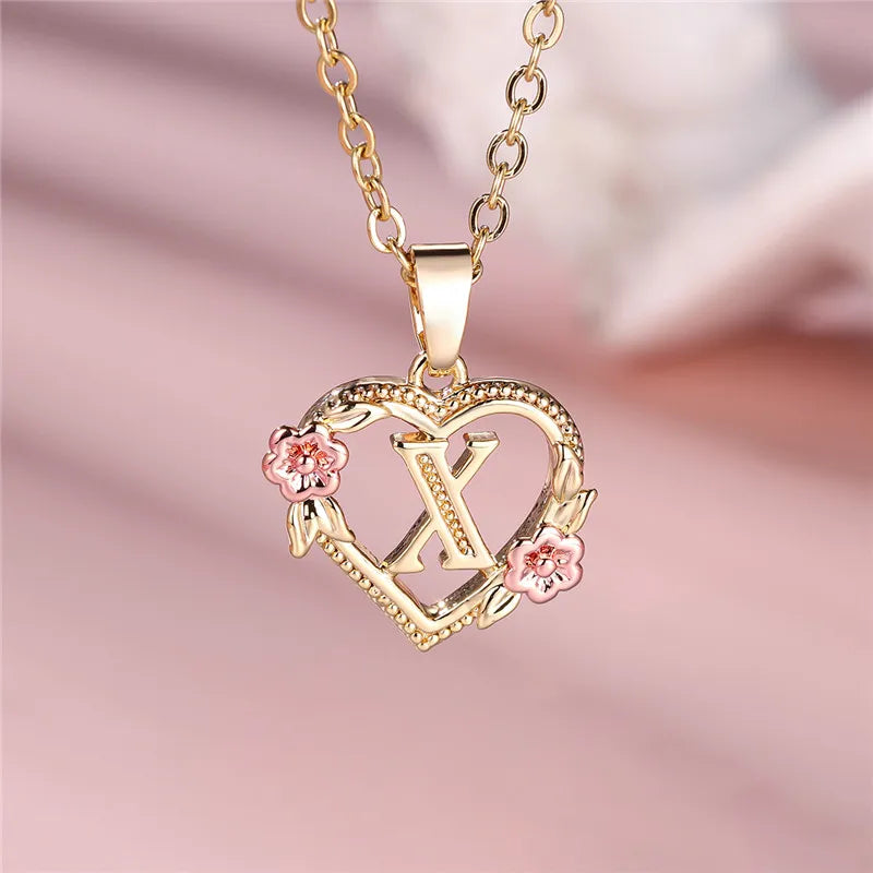 Collar con colgante de inicial, corazón y flores x