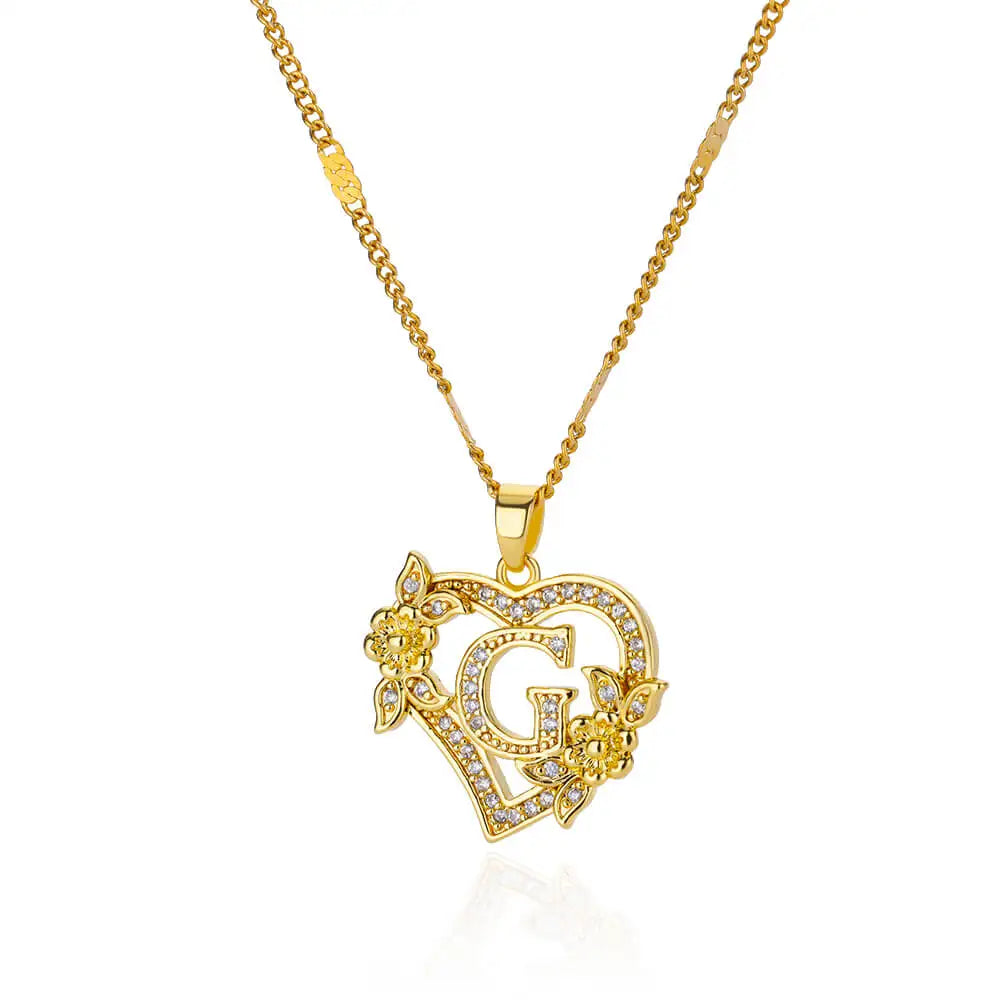 Collar con colgante de inicial y corazón g