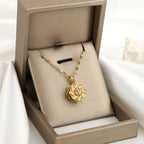 Collar con Colgante Giratorio de Flor Anti-Estrés