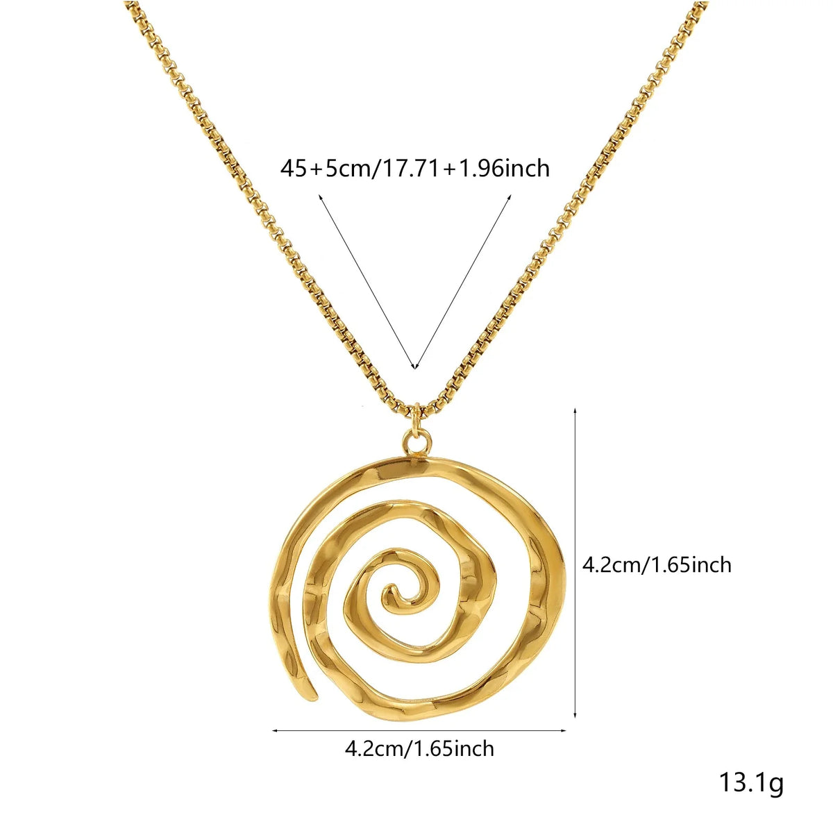 Collar con colgante de espiral dorada