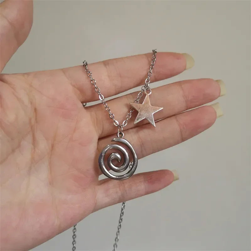 Collar con colgante de espiral y pequeña estrella