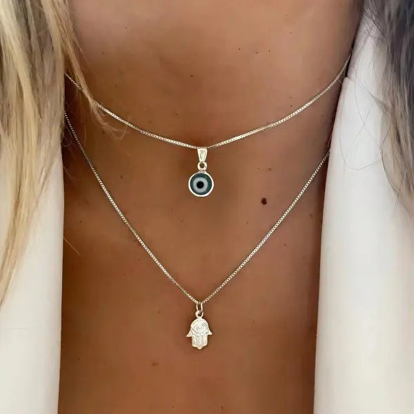Collar doble con colgante Ojo Azul Turco y Mano de Fátima en plata