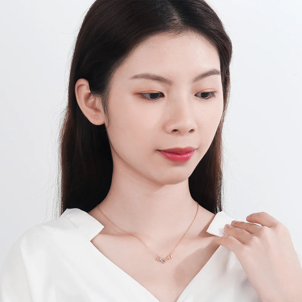 Collar Doble Colgante Infinito y Circonia en oro rosa