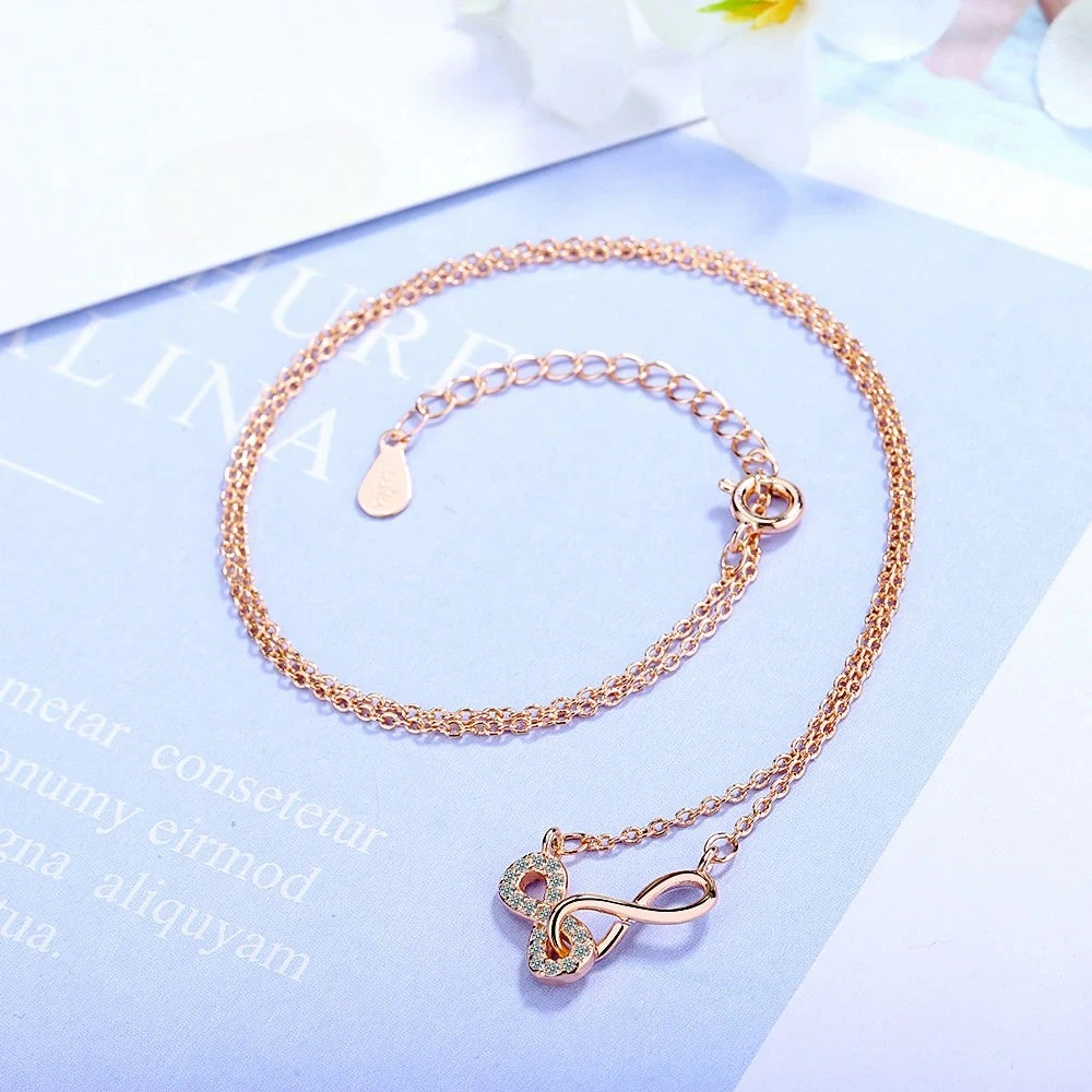 Collar Doble Colgante Infinito y Circonia en oro rosa