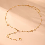 Collar Largo con Colgantes de Trébol de 4 Hojas y Circonio dorado