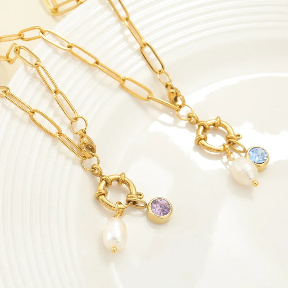 Collar de eslabones con dije de perla y piedra natal de febrero