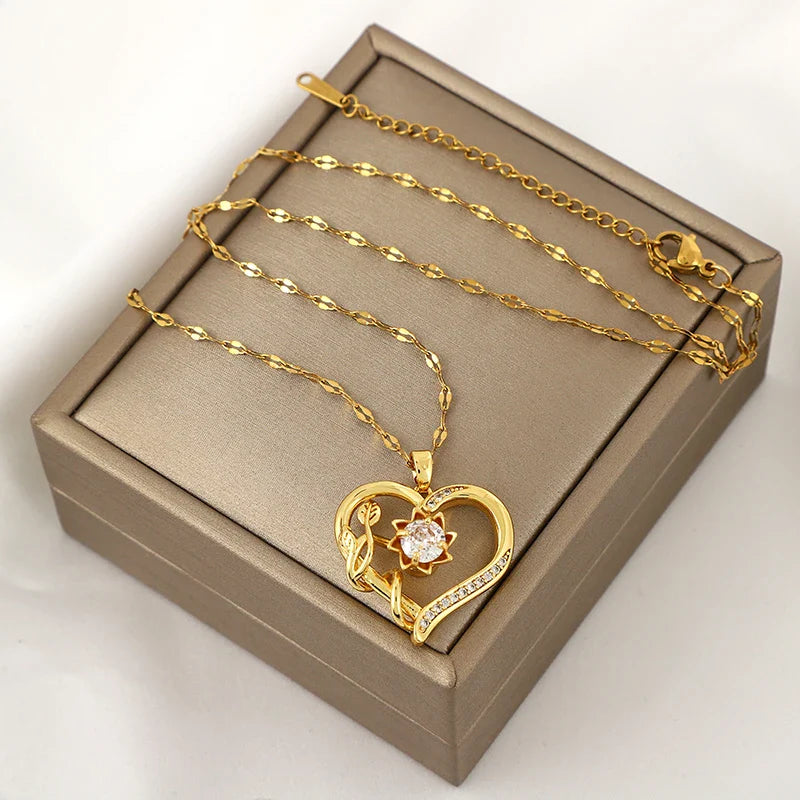 Collar con Colgante de Corazón y Flor Giratoria Anti-Estrés