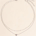 Collar con colgante de corazón y perlas