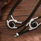 Collar con colgante y pulsera geométricos de plata