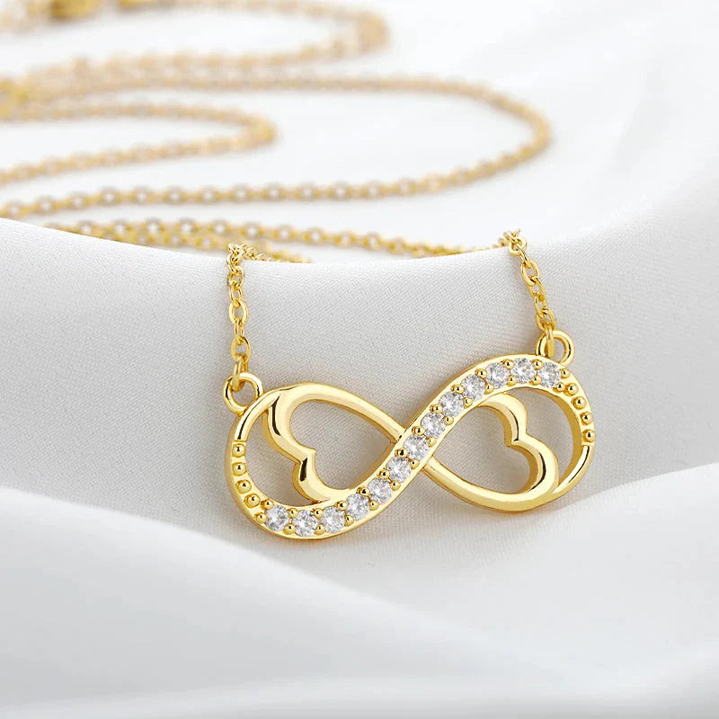 Collar con colgante infinito corazón y circonio dorado
