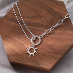 Collar con colgante de sol asimétrico plata