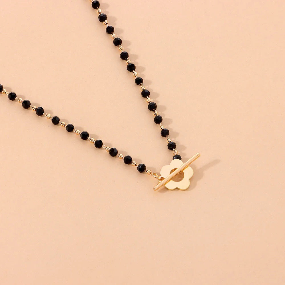 Collar Gargantilla Colgante Flor negra y oro