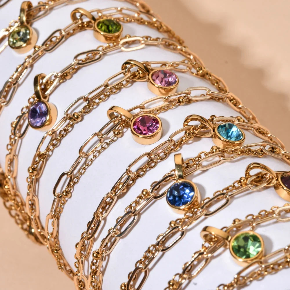Pulsera doble dorada con piedra de nacimiento
