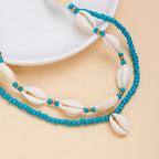 Doble collar de concha cauri turquesa
