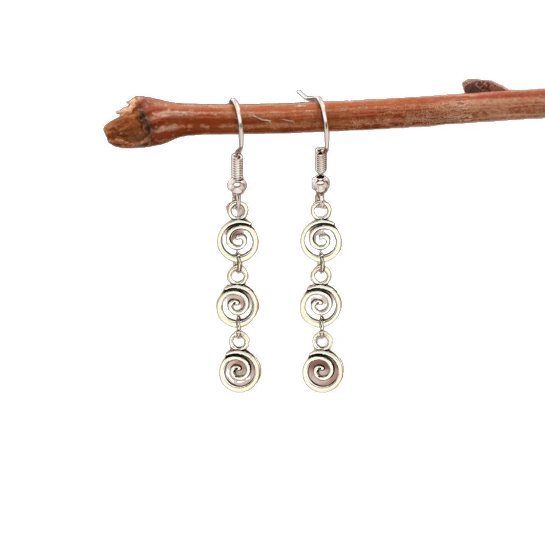 Aretes largas colgantes de espiral