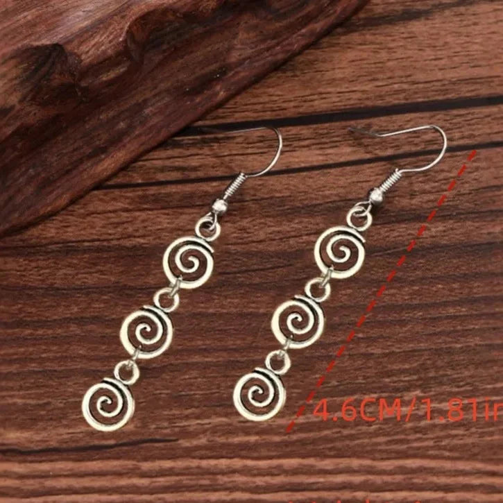 Aretes largas colgantes de espiral