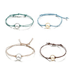 Lote de 4 pulseras de cuerda con colgante redondo de montaña