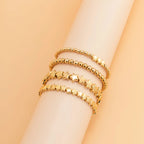 Lote de 4 Pulseras Estrellas oro